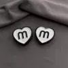 White ticking M love