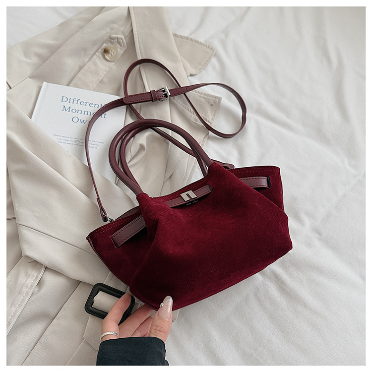 Cestas de platos de mano bolsas de cubo mujeres 2025 nuevo cross-border europeo y americano retro mochila de piel de ciervo esmaltado