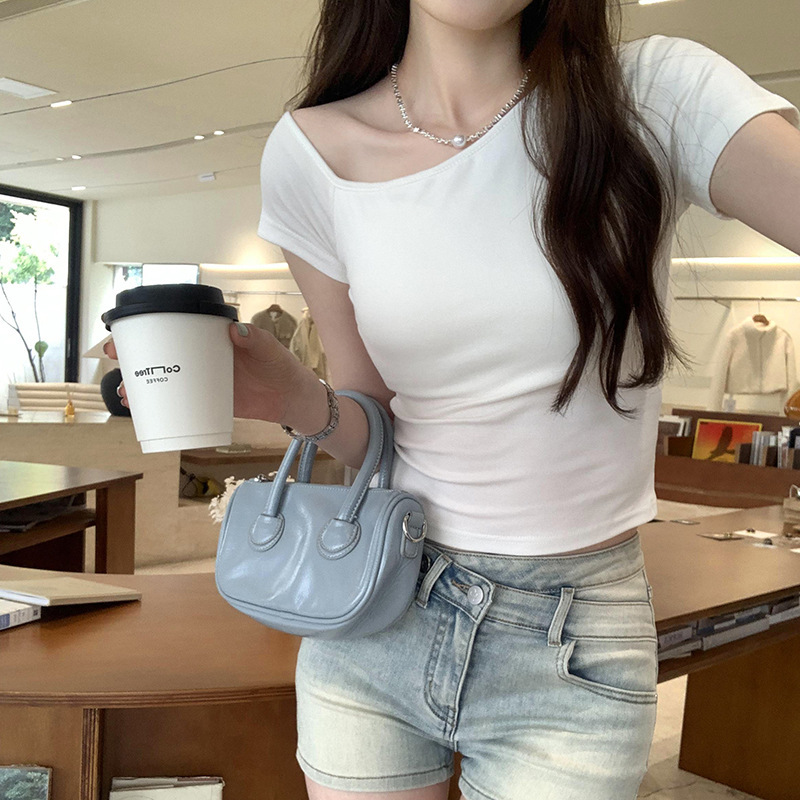 European goods with chest pad slanted shoulder off-shoulder white short sleeve T-shirt women's summer 2025 new niche unique beautiful top European goods with chest pad slanted shoulder off-shoulder white short sleeve T-shirt women's summer 2025 new niche unique beautiful top