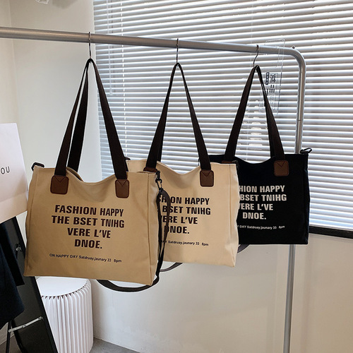 Simple canvas large-capacity casual bag for women 2024 new style lazy style one-shoulder fashion printed letter tote bag