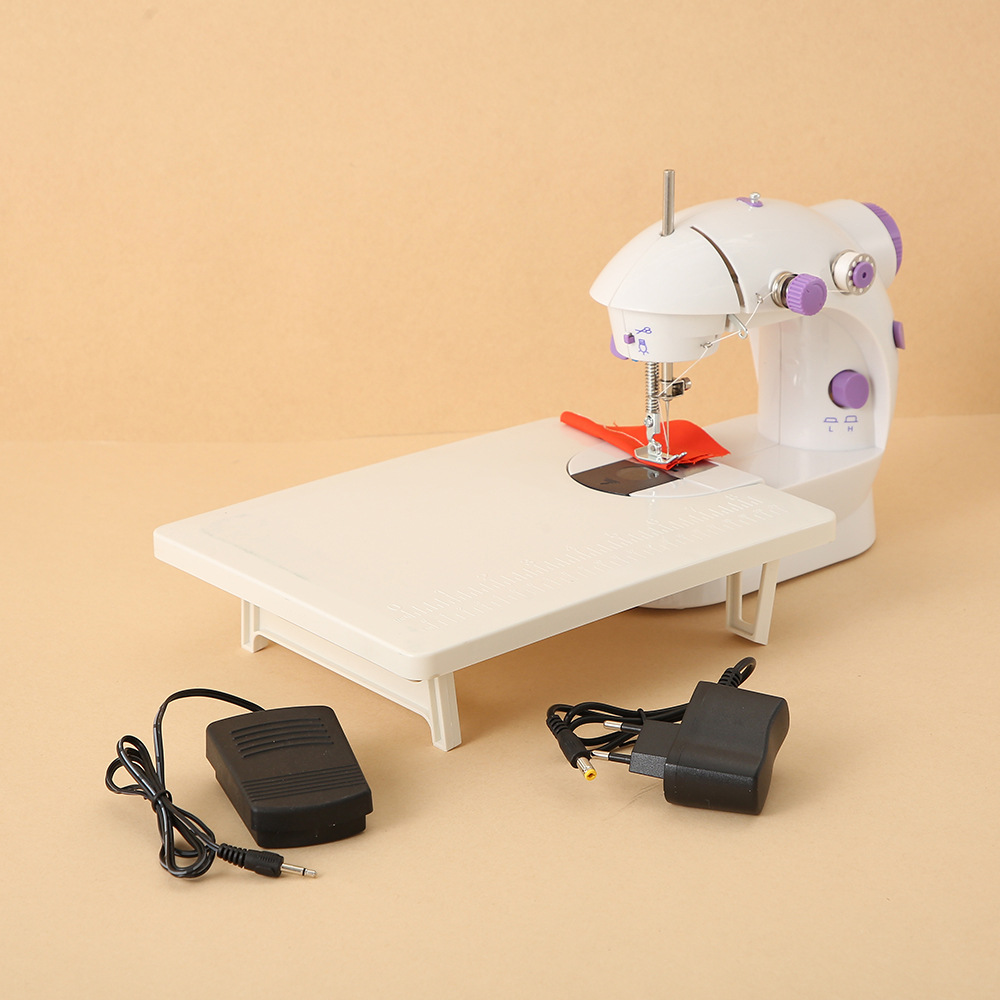 Directo de fábrica del hogar mini máquina de coser automática pequeña máquina de coser eléctrica de escritorio multifuncional fuente de alimentación de calibre europeo y americano