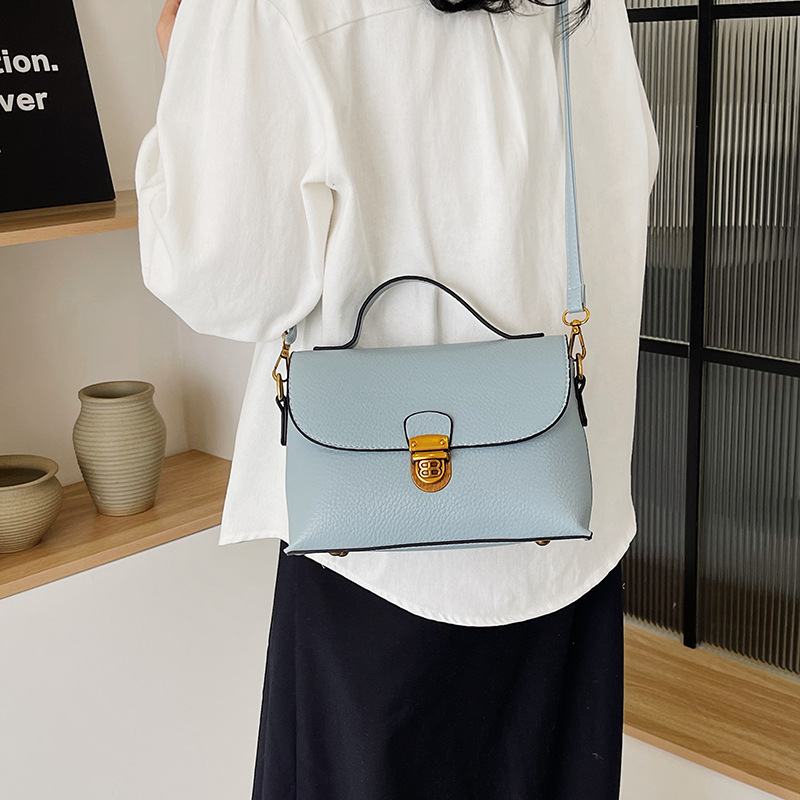 Bolsos de alta calidad para mujer 2024 nueva moda popular bolso de mensajero de un solo hombro versión coreana del bolso cuadrado pequeño portátil de viaje salvaje