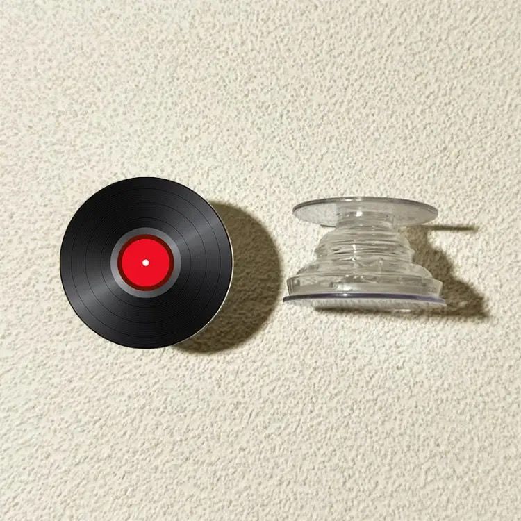 Grabación de CD vinilo redondo airbag soporte adhesivo tipo teléfono móvil adhesivo 360 ° giratorio telescópico succión magnética de corriente de marea