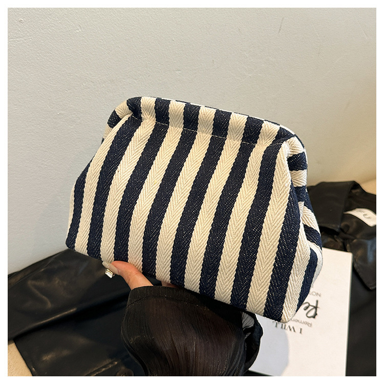 New cross-border fashion color-blocking striped cosmetic bag, women's loose change mobile phone storage bag, trendy and niche cloud clutch undefined