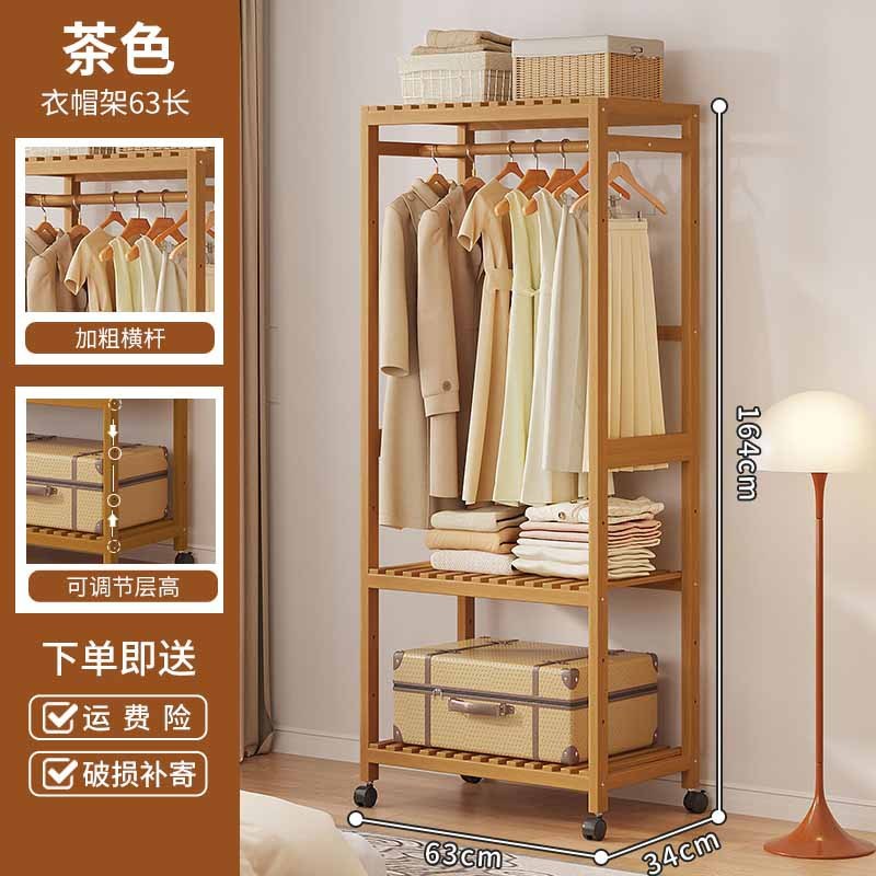 ハンガーを掛けて着地した寝室の家庭用ロッカー付き収納ベッドの上の夜に服を置く楠竹多機能フードラック|undefined