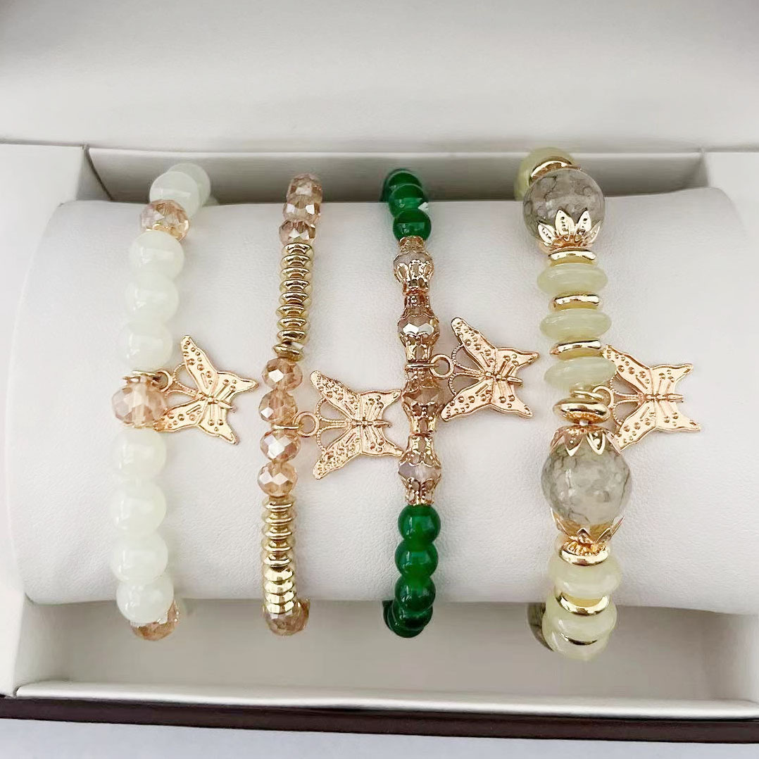 Juego de cuatro piezas de brazalete verde