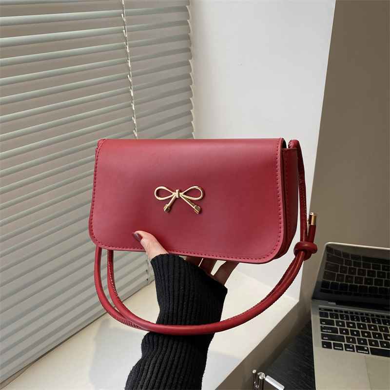 2025 verano nuevo estilo nicho bolso de axila moda femenina bolso cuadrado pequeño portátil ins bolso de hombro de estilo occidental