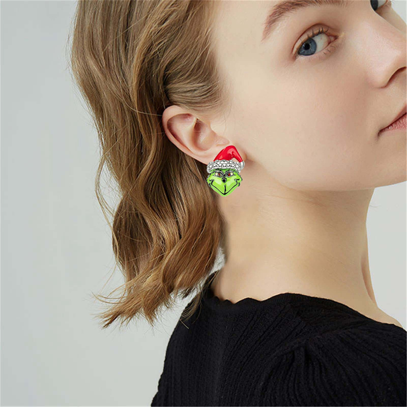 Moda europea y americana transfronteriza Navidad Grinch verde piel monstruo pendientes personalizados creativos en forma de mano joyería de estilo de fiesta