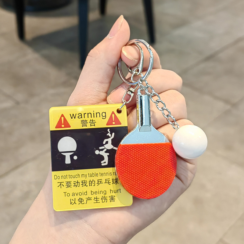 Flying ping pong warning sign + big ping pong ball