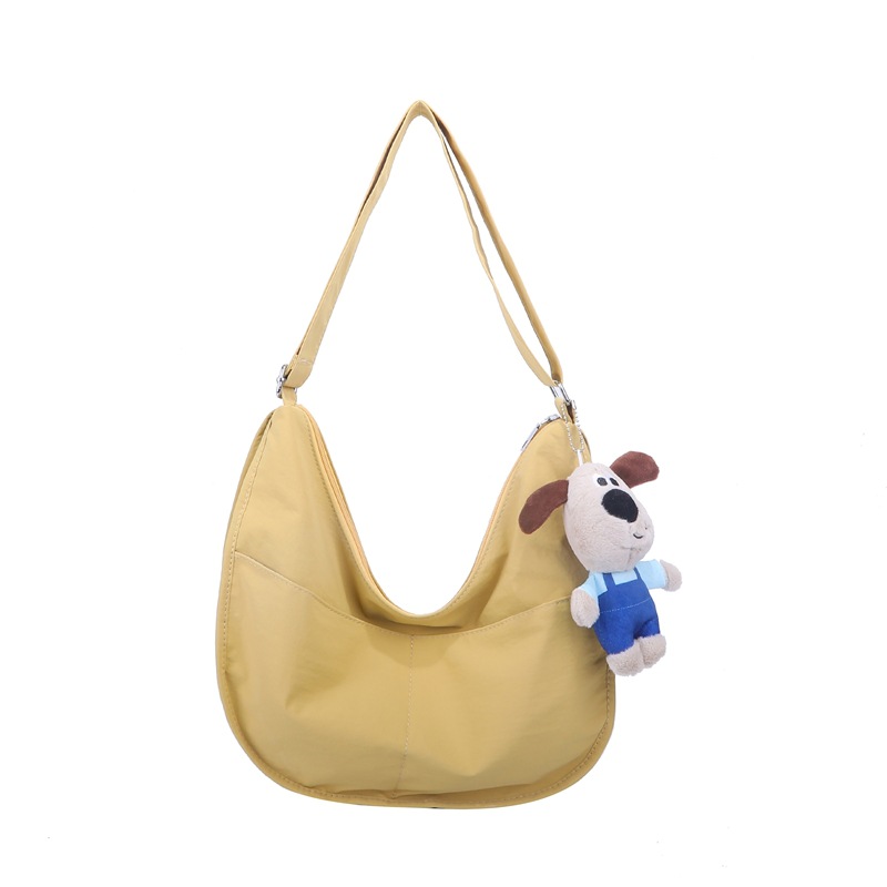 Bolsa de hombro coreana para niños y niñas de color sólido de gran capacidad bolsas de饺os para niños 2025 nuevas bolsas para niños con colgantes