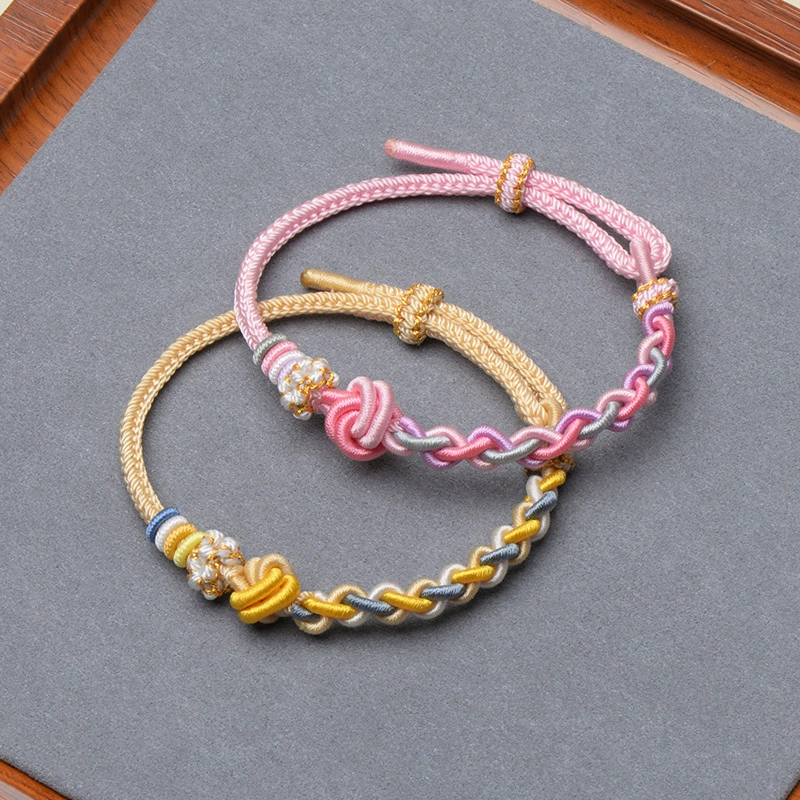 Woven accessory handmade with pigtail, golden red rope bracelet