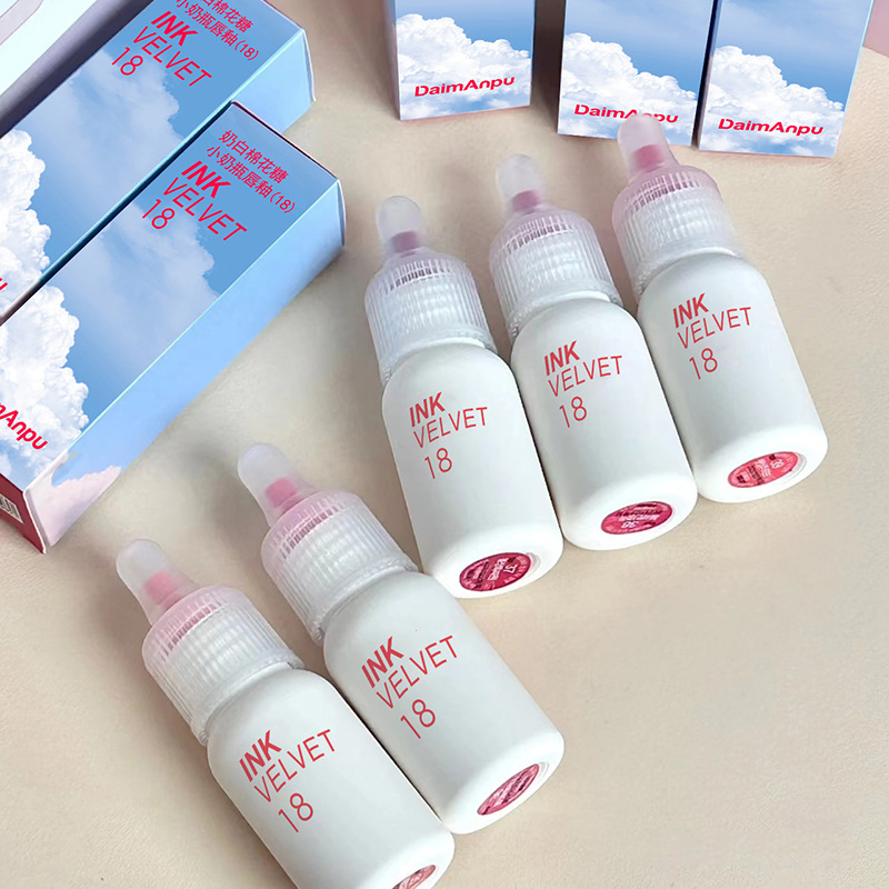 Cross-border DAIMANPU small baby bottle mirror lip gloss, water light glass jelly lip, affordable domestic milk tea lipstick lip gloss full figure