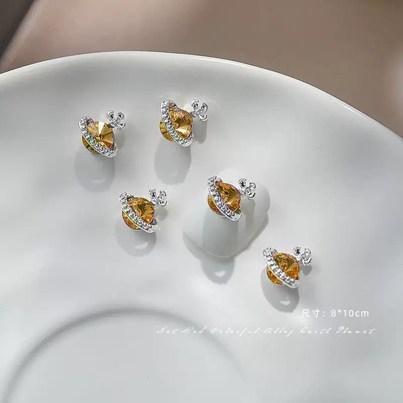 西太后の星のネイルアクセサリーの新型の超フラッシュのネイルドリルの合金の爪の装飾ネットの赤い爆発のネイルドリル|undefined