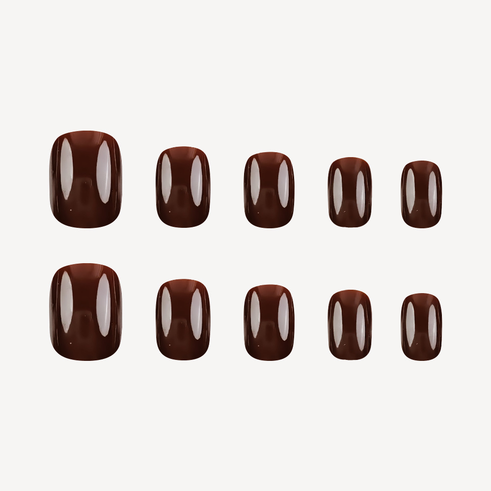 Ventas transfronterizas calientes de uñas marrón oscuro temperamento de la atmósfera corta 24 piezas de uñas falsas de color sólido terminadas
