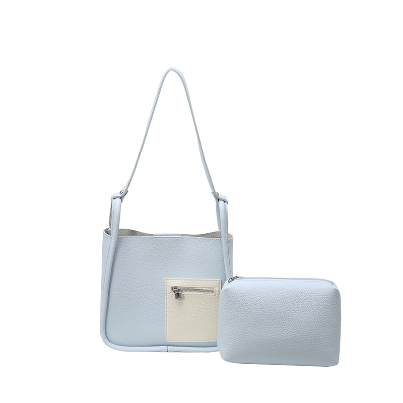 Bolso de axila popular de este año 2025 verano nuevo bolso femenino moda patrón de lichi bolso de hombro de color de contraste