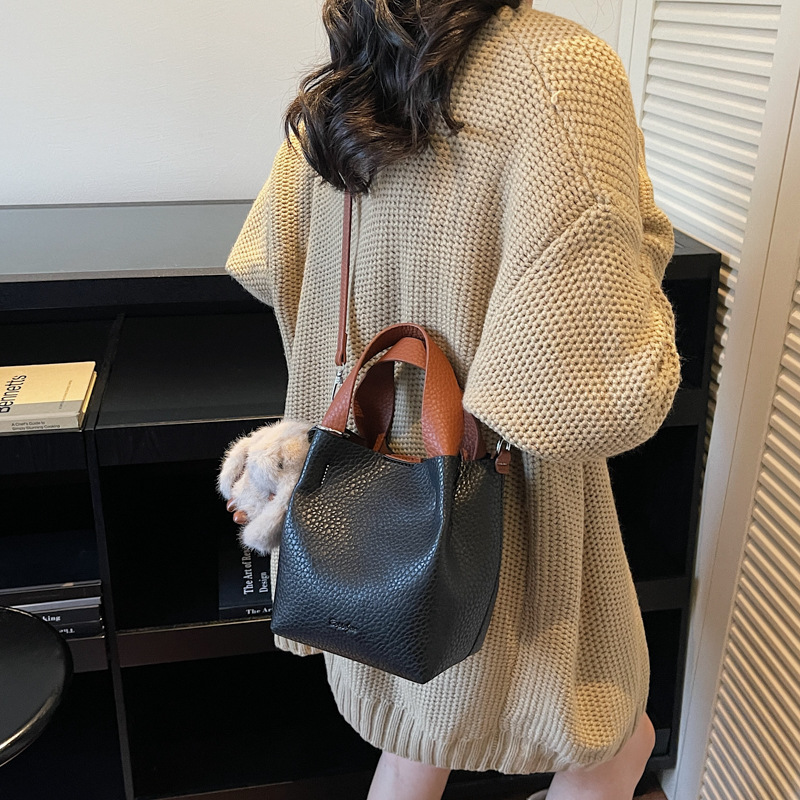 Bolso coreano con estampado de litchi para mujeres 2025 nuevo bolso de cubo de alta calidad de moda versátil bolso de hombro