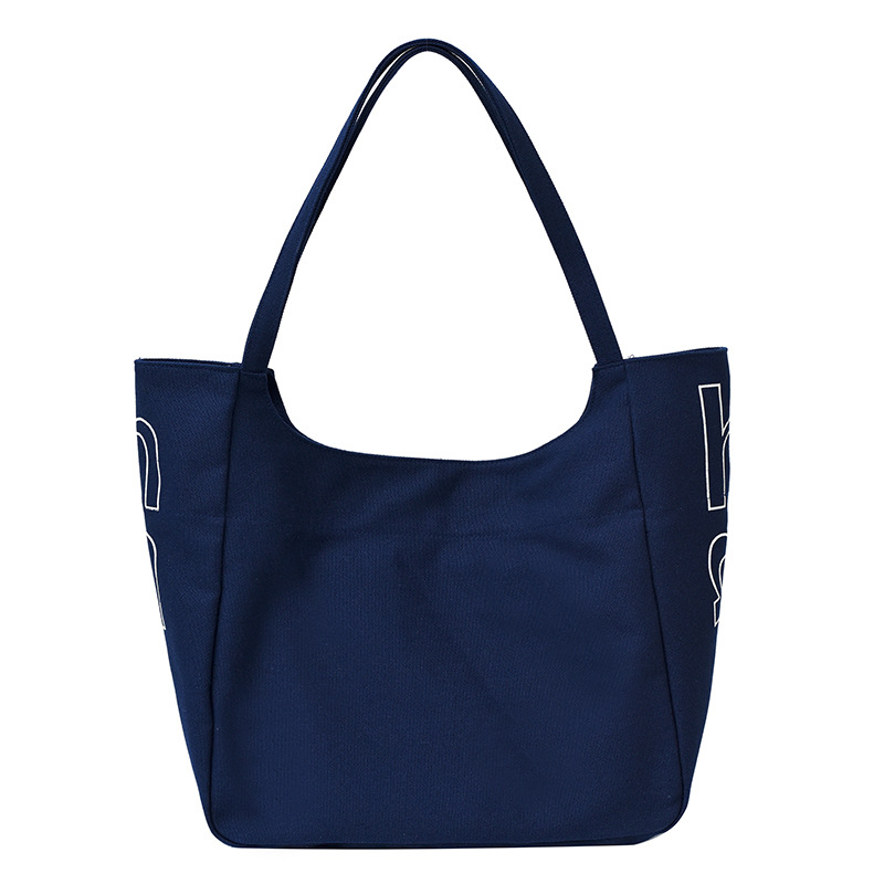 Bolso Tote de moda coreana 2025 verano nuevo estilo bolso femenino casual alfabeto bolso de hombro de lona estilo universitario