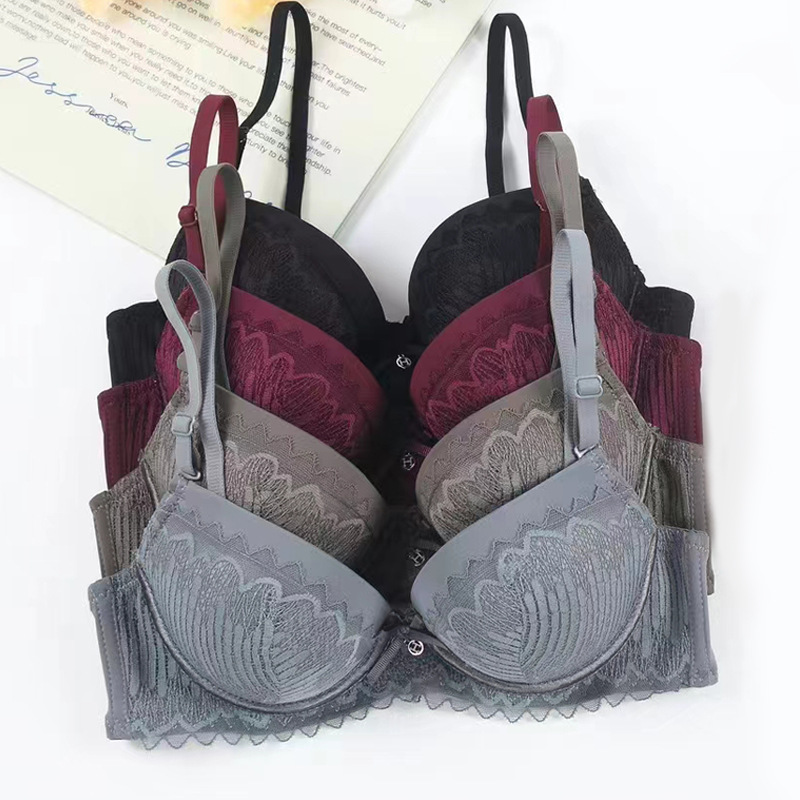 Fábrica de Shantou en forma de corazón en el lugar de la copa de la cabeza de acero gruesa para juntar ropa interior de pecho pequeño damas con anillo de acero sujetador de encaje