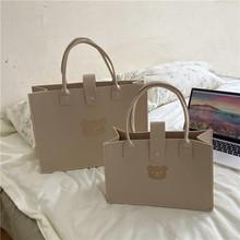 原创设计可爱卡通小熊毛毡手提包简约纯色购物袋大容量便携包包