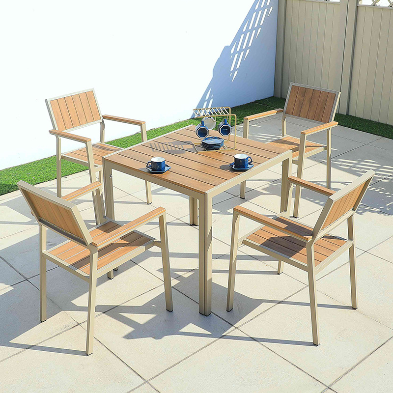 Mesa y silla de ocio al aire libre combinación de patio al aire libre jardín balcón impermeable anti-solar frente anticorrosión madera plástica mesa de madera