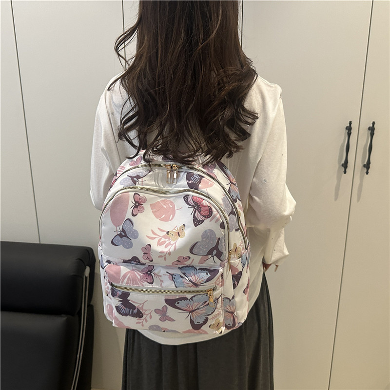 2025 nueva moda versátil mochila impresión dulce estilo universitario alto valor de la cara mochila de estudiantes bolso de hombro