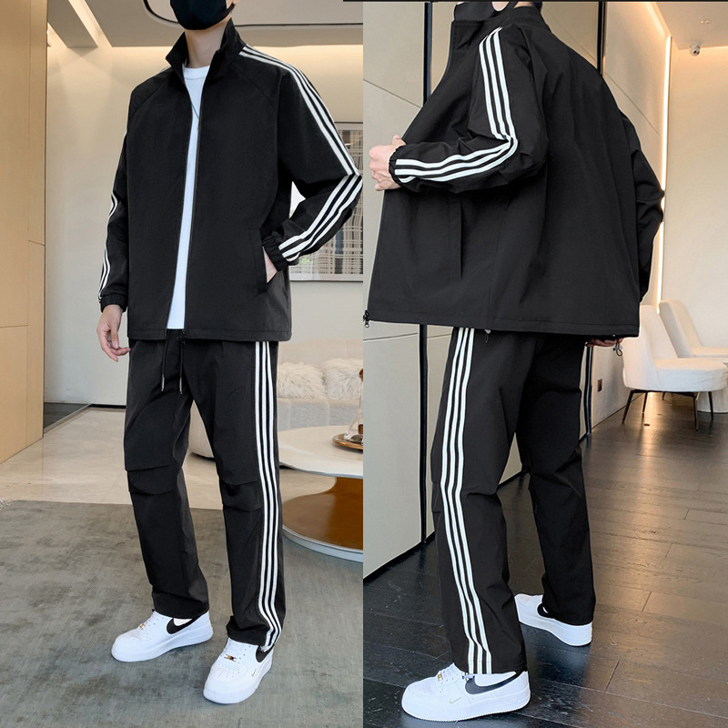 Primavera y otoño transfronterizos chaqueta delgada ropa deportiva hombre ocio tres barras juego de deporte de correr al aire libre dos piezas juego de comercio exterior