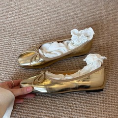 羊の皮の版 ~ 金色の浅い口の蝶結びの靴の女性の平底の快適な乳の靴のフランスの1足はバレエの靴を漕ぎます。