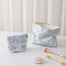 新款浮雕小清新百合花朵化妆包便携旅行护肤品收纳袋化妆袋零钱包