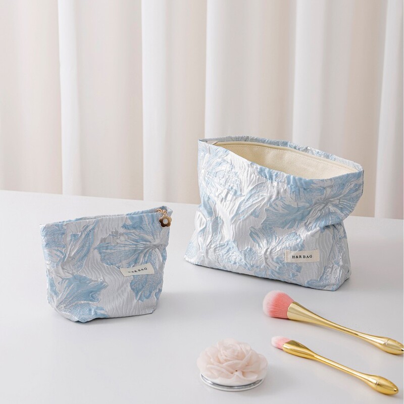 New Embossed Small Fresh Lily Flower Cosmetic Bag Portable Travel Skin Care Storage Bag Cosmetic Bag Coin Purse New Embossed Small Fresh Lily Flower Cosmetic Bag Portable Travel Skin Care Storage Bag Cosmetic Bag Coin Purse