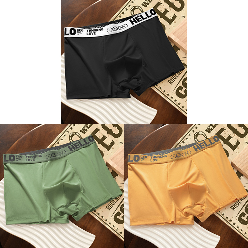 Ropa interior masculina, letras juveniles, cintura media suelta y cómoda, transpirable y sin costuras, pantalones cortos de cuatro esquinas para estudiantes al por mayor