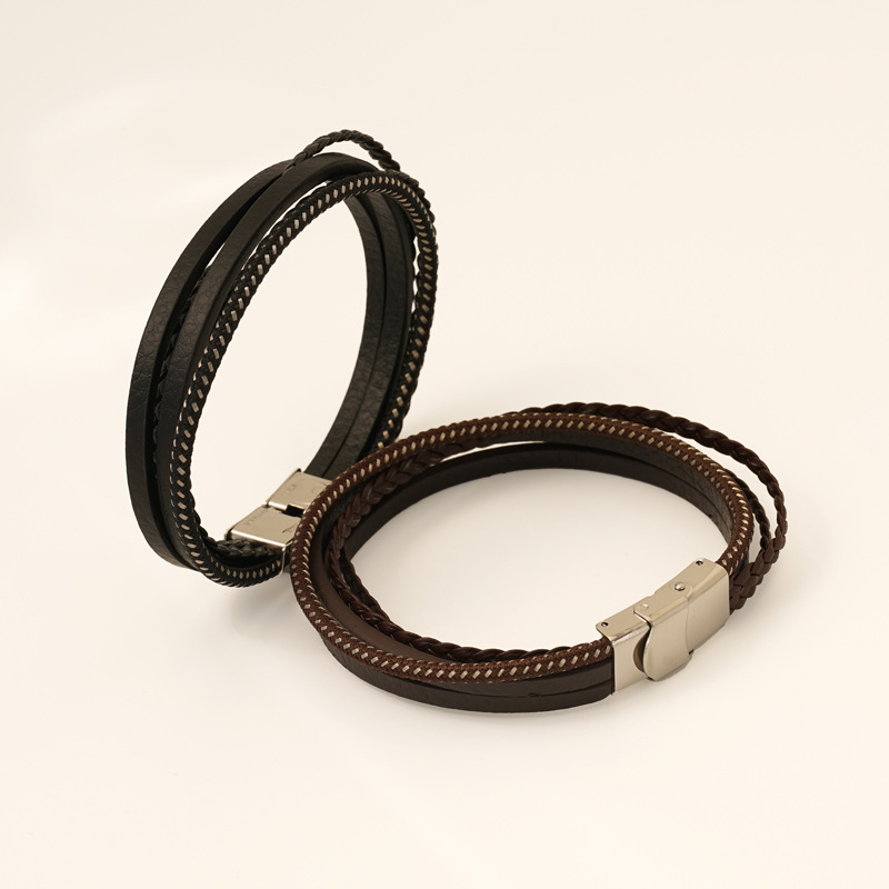 Nuevo pulsera de cuero trenzada de cuerdas al por mayor Europa y América moda hombre pulsera de cuero de acero inoxidable personalidad pulsera de cuero multicapa