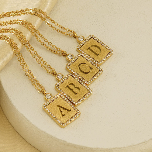 European and American INS style titanium steel sand-pressed hollow 26 English letter pendant 18K stainless steel diamond letter necklace for women