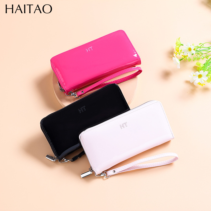 Bolso de pulsación de una sola mujer moda coreana zipper bolso de teléfono móvil esmaltado bolso de mano brillante bolso de tarjeta múltiple