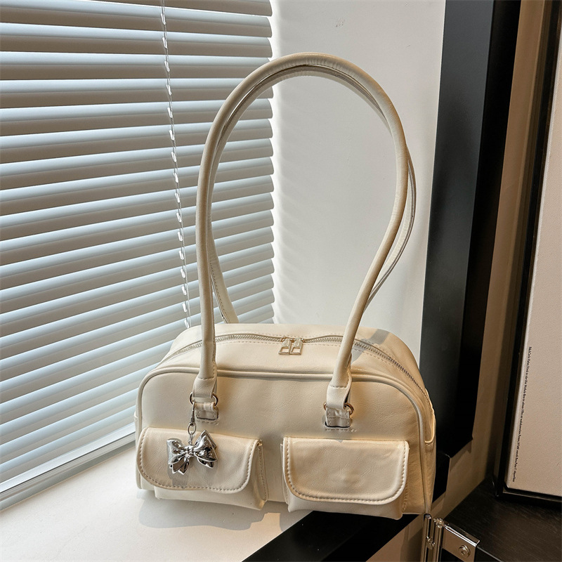 Bolsa de brazo retro para mujeres 2025 nueva textura de un solo hombro bolso de mano nicho de gran capacidad Volkswagen bolso de doble bolsillo