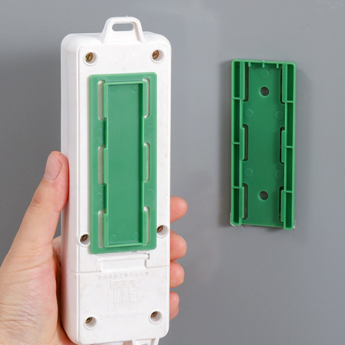 Plug holder wall-mounted socket plug-in row storage rack free of punching wall hanging household wall-mounted wire storage