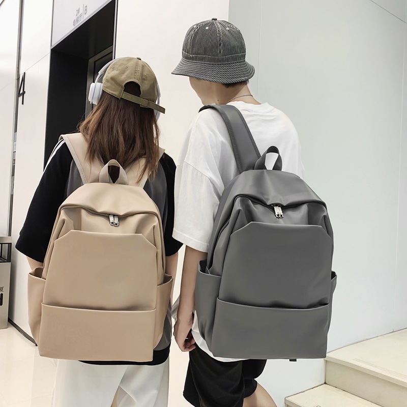 Mochila de sentido avanzado para mujer nueva versión coreana de la mochila simple para hombre, estudiante de secundaria, cuero suave, mochila de viaje para computadora, marea