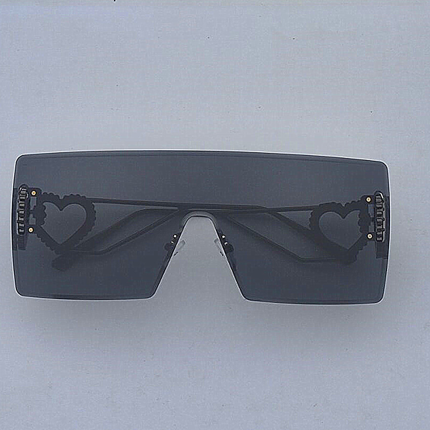 Occhiali da sole rotondi rétro da donna con montatura nera moda_voghion.com