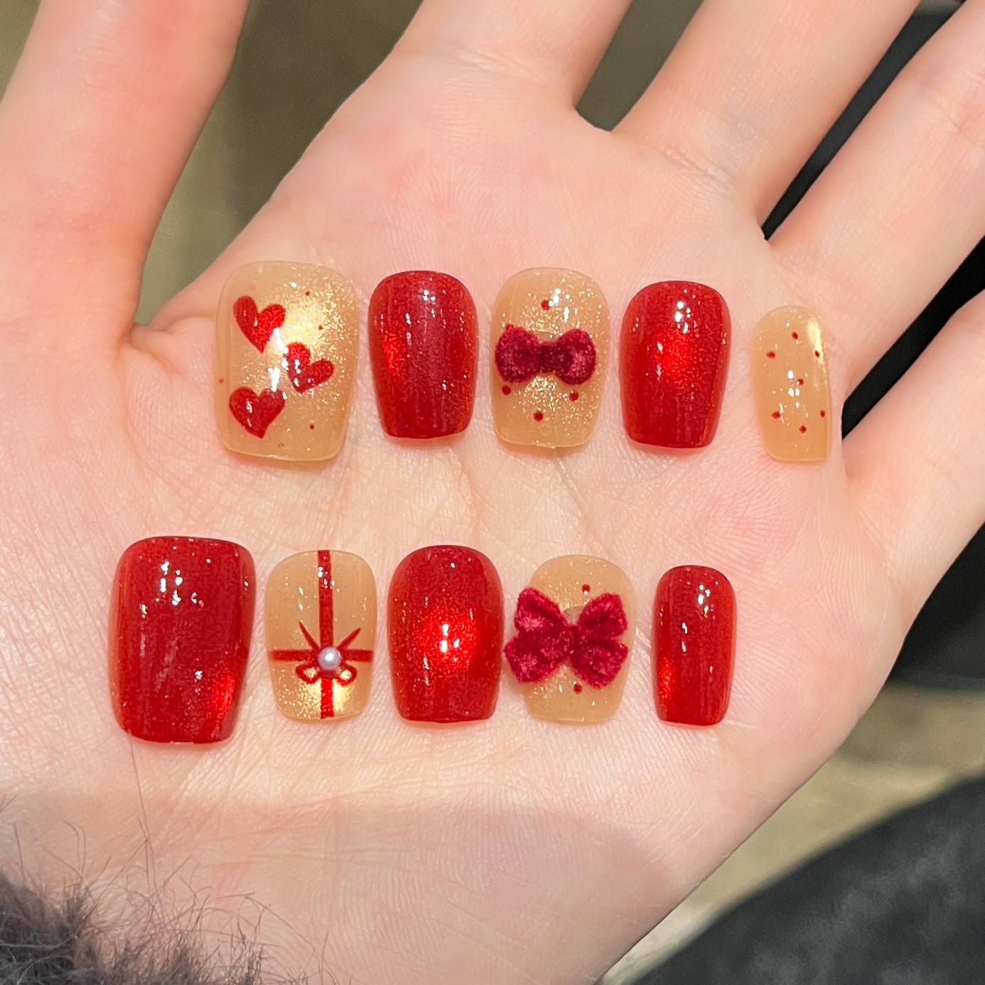 Arco de seda para usar uñas cortas lindas uñas rojas falsas de Año Nuevo ojos de gato para usar uñas gruesas