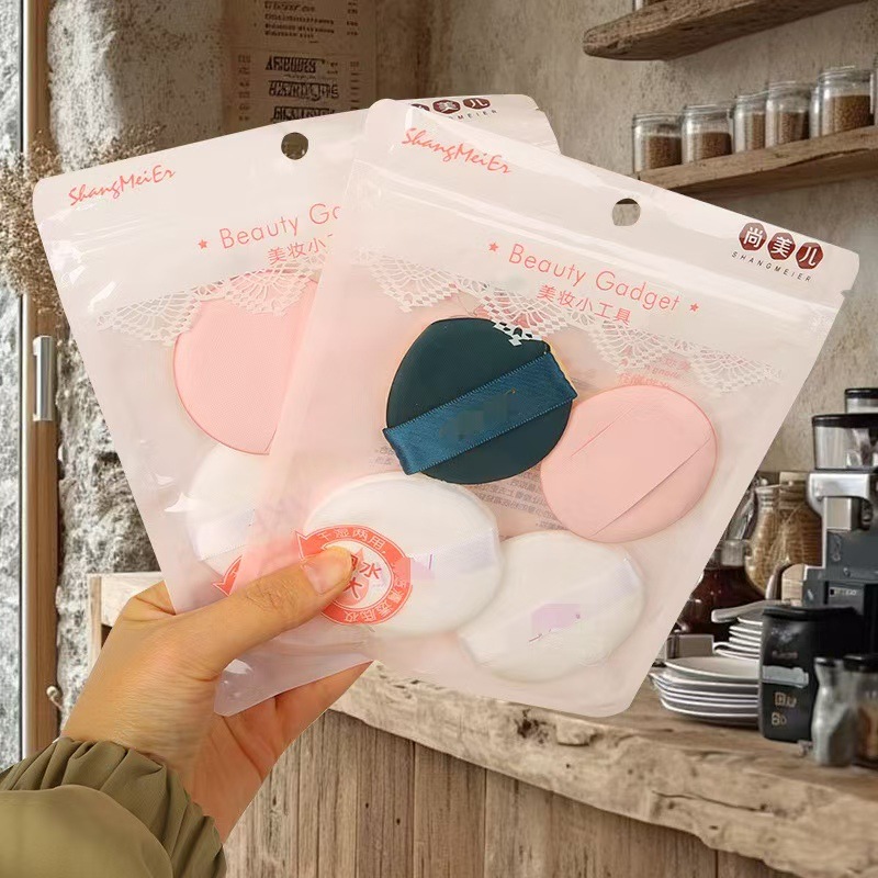 Polvo de cojín de aire con bolsa de almacenamiento huevo de maquillaje redondo dos conjuntos de polvo de marshmallow seco y húmedo al por mayor