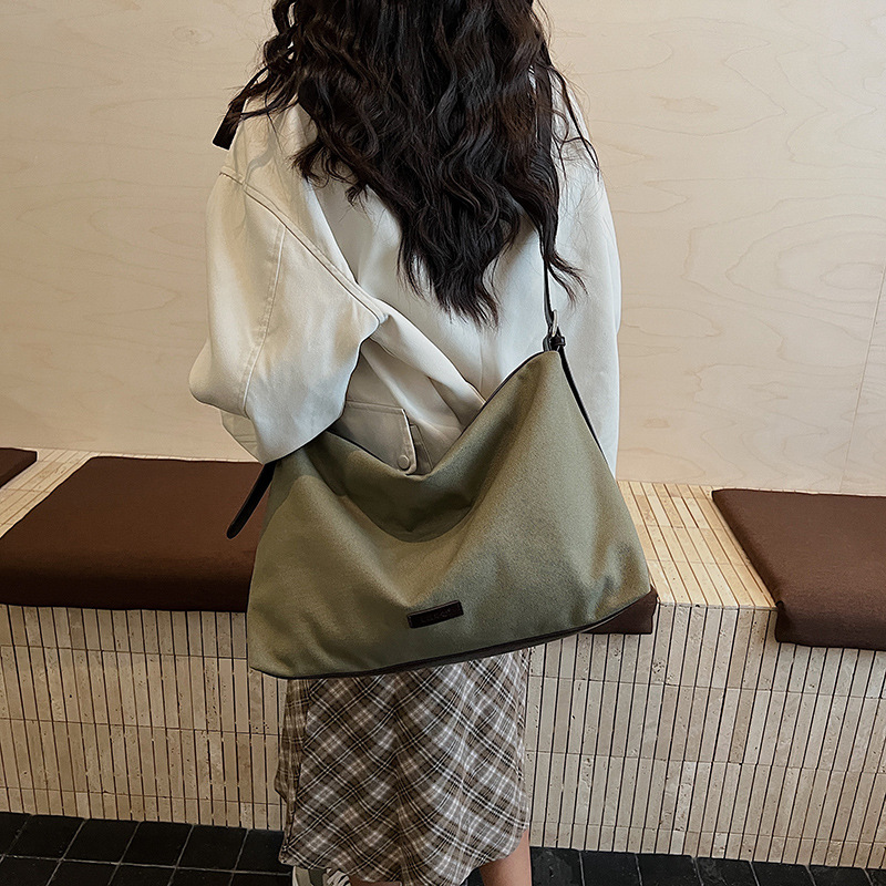2025 otoño y invierno nuevo estilo coreano perezoso bolsa de lona de moda de mujer gran capacidad de hombro mochila de viaje bolsas de brazo