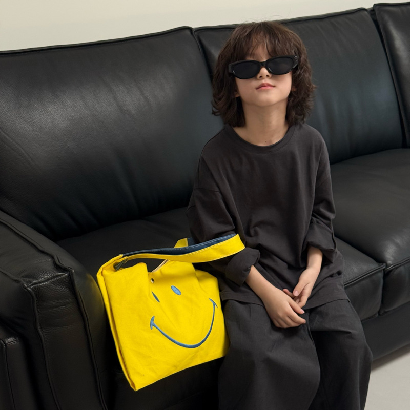Versión coreana del popular bolso de hombro para niños y niñas, lindo y lindo bolso de mensajero para niños sonriente, estilo occidental, bolso para niños de gran capacidad