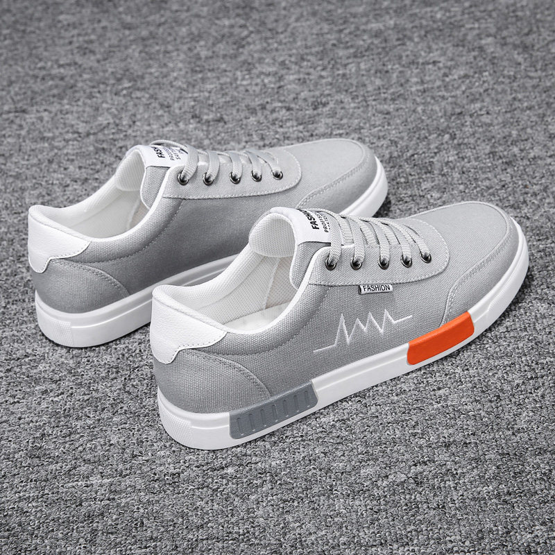 Zapatos de lona para hombres 2024 primavera zapatos de hombre nuevos zapatos casuales de hombre zapatos deportivos de altura baja tendencia versátil zapatos de plantilla