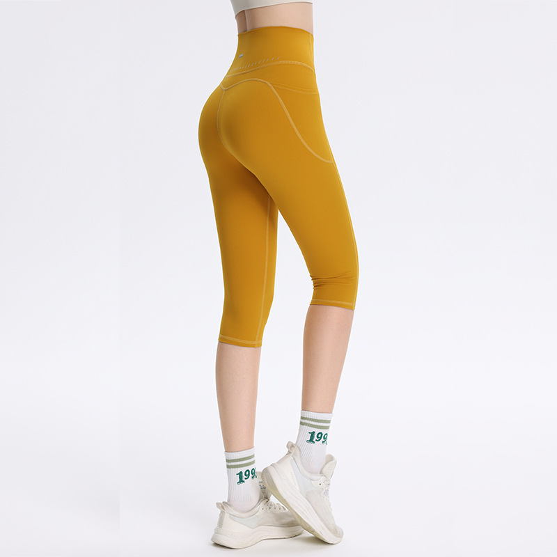 女性用ヨガショーツ、ハイウエストピーチヒップリフティングフィットネスサイクリングパンツ、速乾性タイトクロップドパンツ、ヌードフィールトレーニングパンツ|undefined