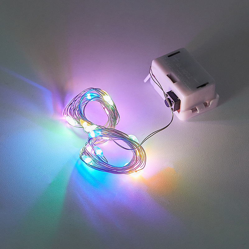 Caja blanca pequeña lámpara de alambre de cobre led botón batería linterna de Navidad luz intermitente cadena de bola de onda decoración al por mayor alambre de cobre