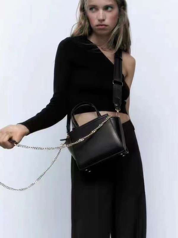 Moda transfronteriza nueva bolso de mujer bolso de mano red coreana esmalte brillante alas bolso de hombro