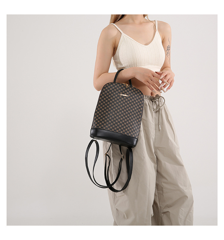 A stylish and trendy casual backpack for the 2024 autumn and winter season, featuring a large-capacity single-shoulder women's retro commuting crossbody bag undefined