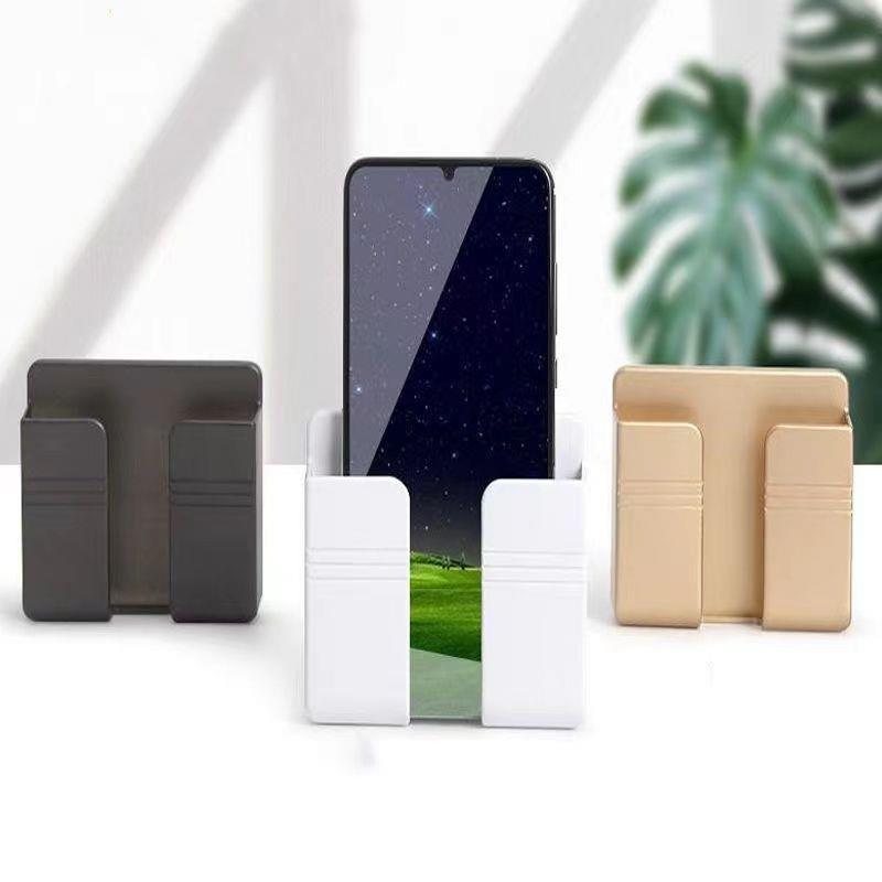 Soporte de la base de carga del teléfono móvil rack de control remoto montado en la pared multifunción rack de almacenamiento de pared al por mayor