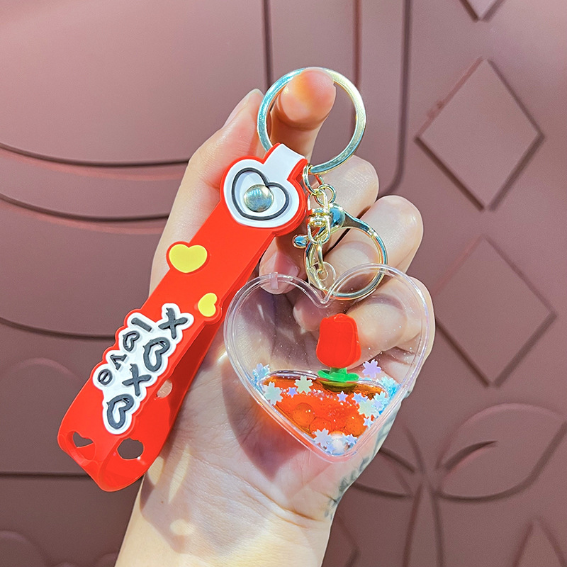 Petróleo amor tulipas llavero estereoscópico muñeca exquisita pareja colgante bolsa de automóvil garra máquina regalos al por mayor