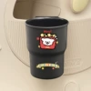 [Black plastic cup holder] French fries lines