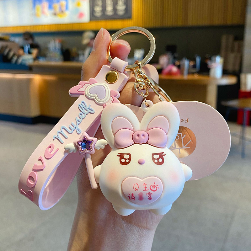 Caricatura goteo de pegamento Maji conejo llavero accesorios interesantes bonitos bolsos escolares colgante llavero de mujer al por mayor